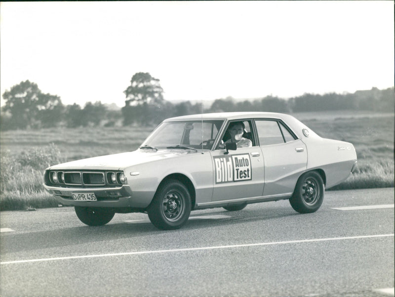 Datsun 240K GT (C110) - Vintage Photograph