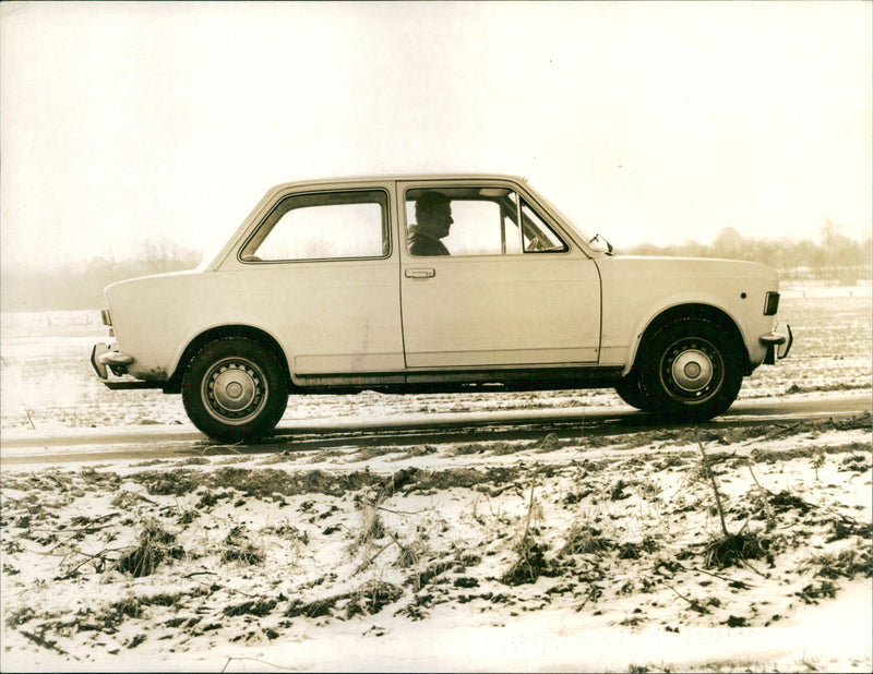 Side View of 1970 Fiat 128 - Vintage Photograph