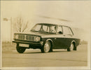 1970 Volvo 144 sedan - Vintage Photograph