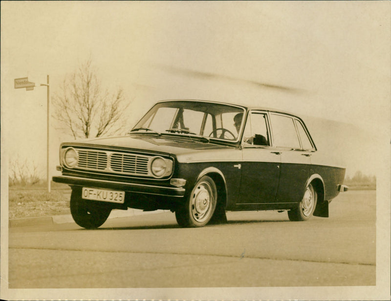 1970 Volvo 144 sedan - Vintage Photograph