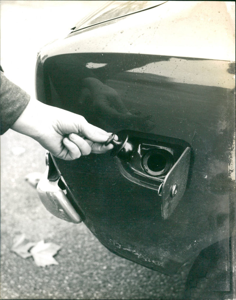 Opening a Gas Cap Cover - Vintage Photograph