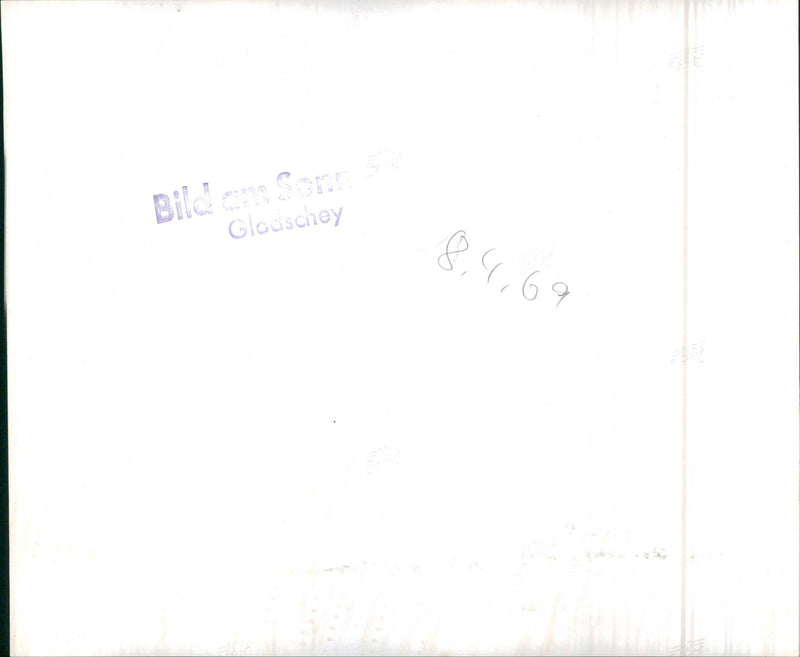 A Man Holding a Car Engine - Vintage Photograph