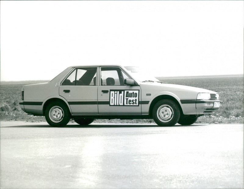 1970 Mazda 626, side view - Vintage Photograph