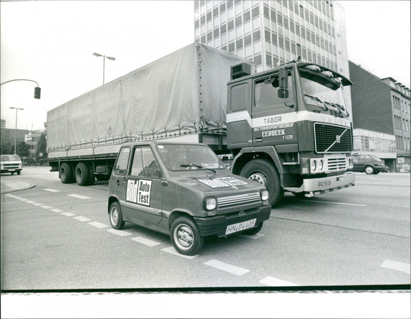 Microcar Bonny 50 GL and Volvo Truck - Vintage Photograph