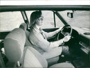 A woman driving - Vintage Photograph
