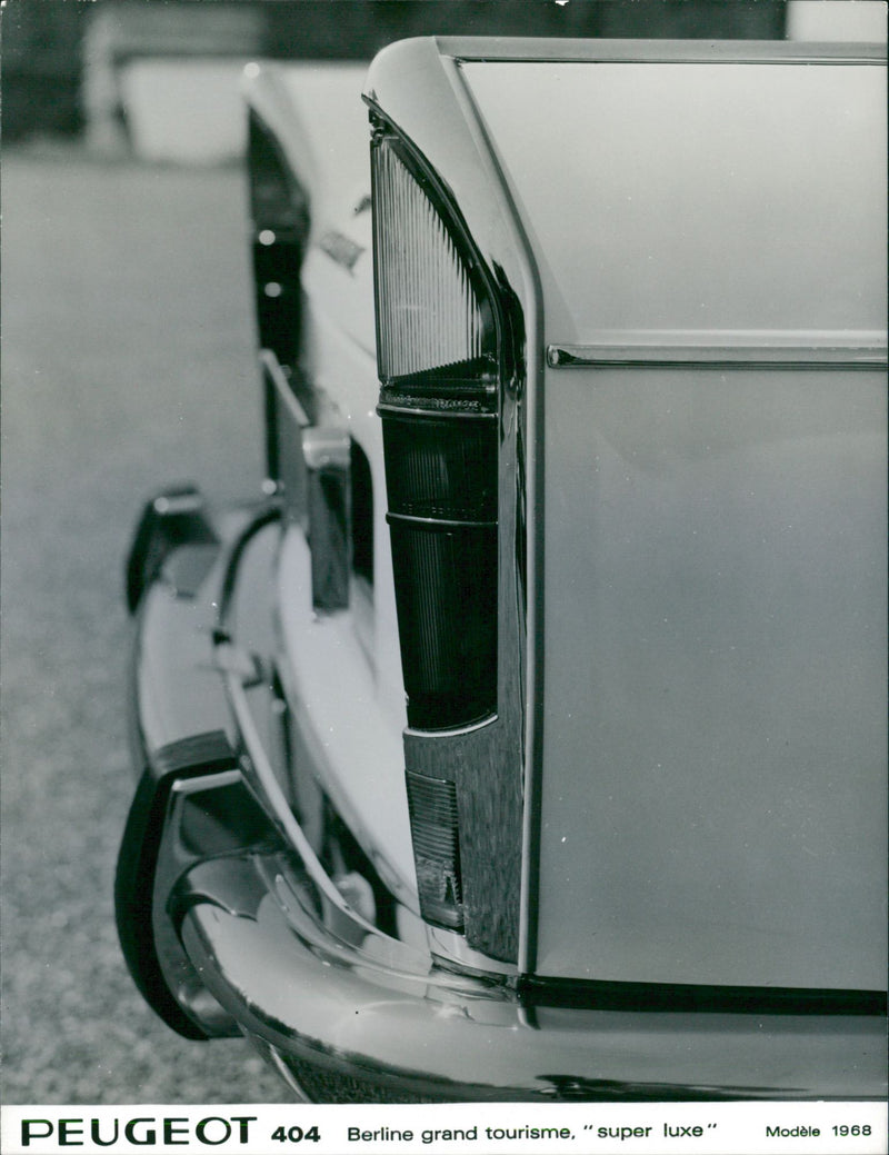 Backlight of 1968 Peugeot 404 Super Luxe - Vintage Photograph