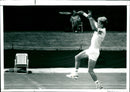 Tennis player in action - Vintage Photograph