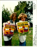 Naomi & Guily modelling the latest in softdrinks - Vintage Photograph