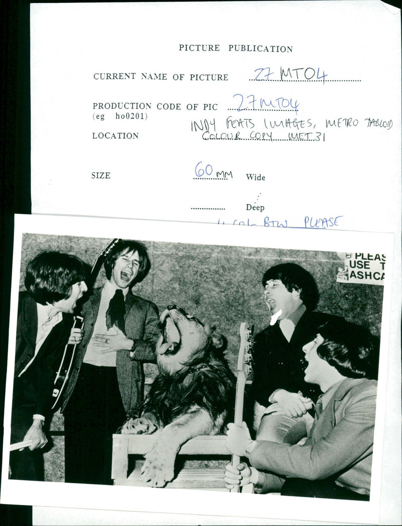 Musicians and a Lion. - Vintage Photograph