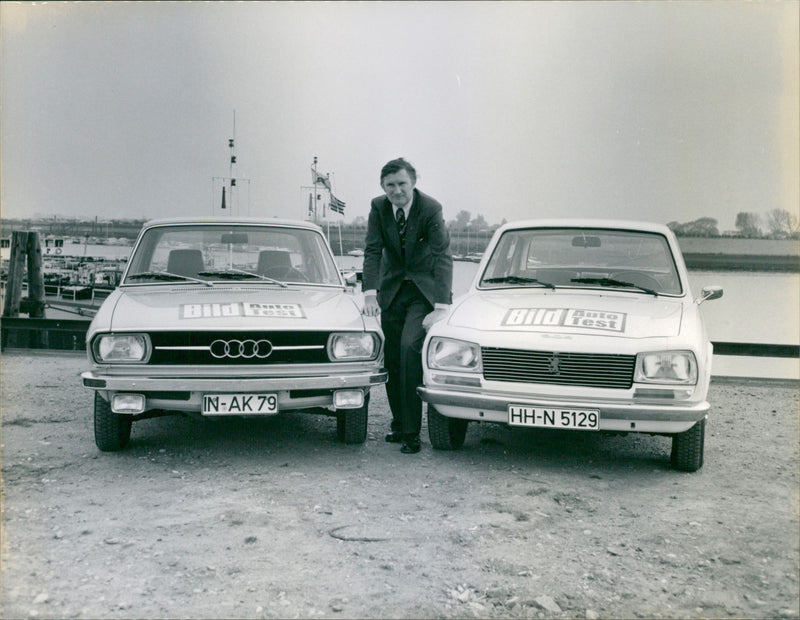 Audi and Peugeot - Vintage Photograph
