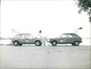 Volkswagen and Peugeot - Vintage Photograph