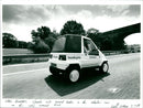 Karl Bowers in an Electric Car - Vintage Photograph