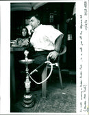 ! H8 cafe just An arab smehing Hubble - Bubble Pipe ( Marble . Arch Enel ) o - Vintage Photograph