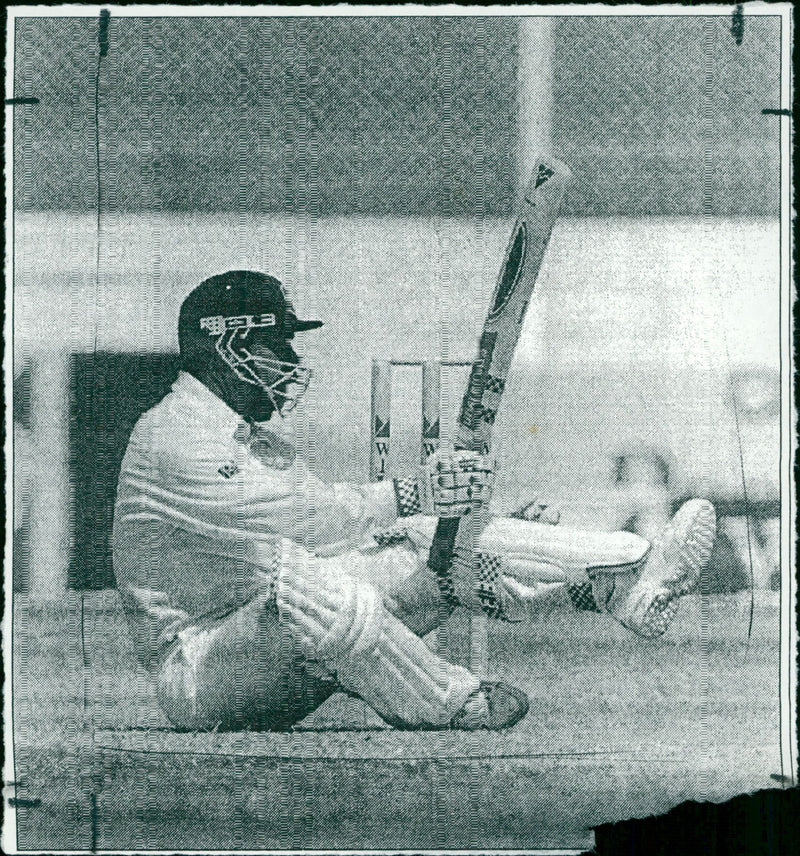 Cricket player hold a cricket bat - Vintage Photograph