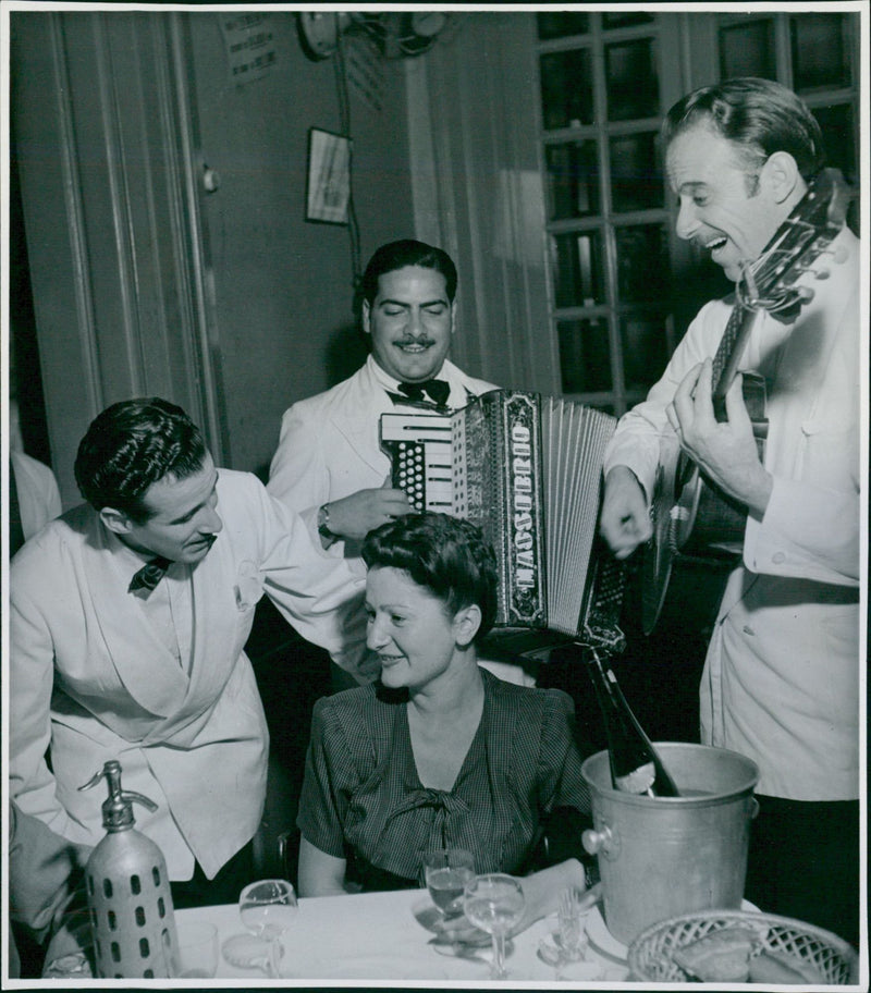 Restaurant life in Buenos Aires. Singing waitors - Vintage Photograph
