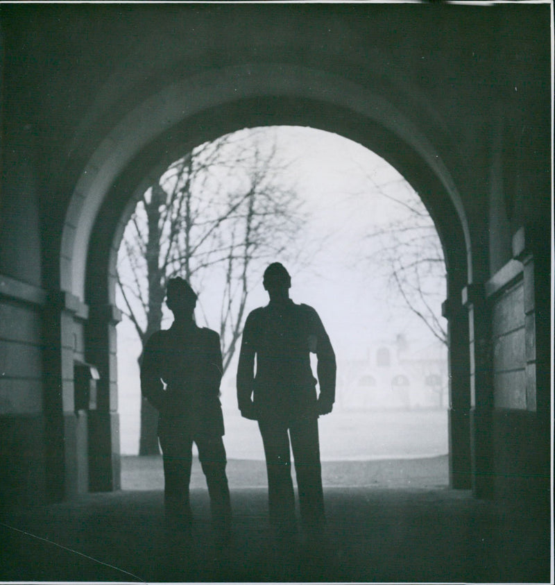Two military men standing in a tunnel 1940 - Vintage Photograph