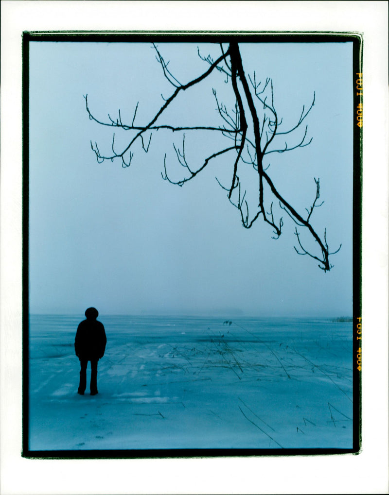 Person walking in winter landscape - Vintage Photograph