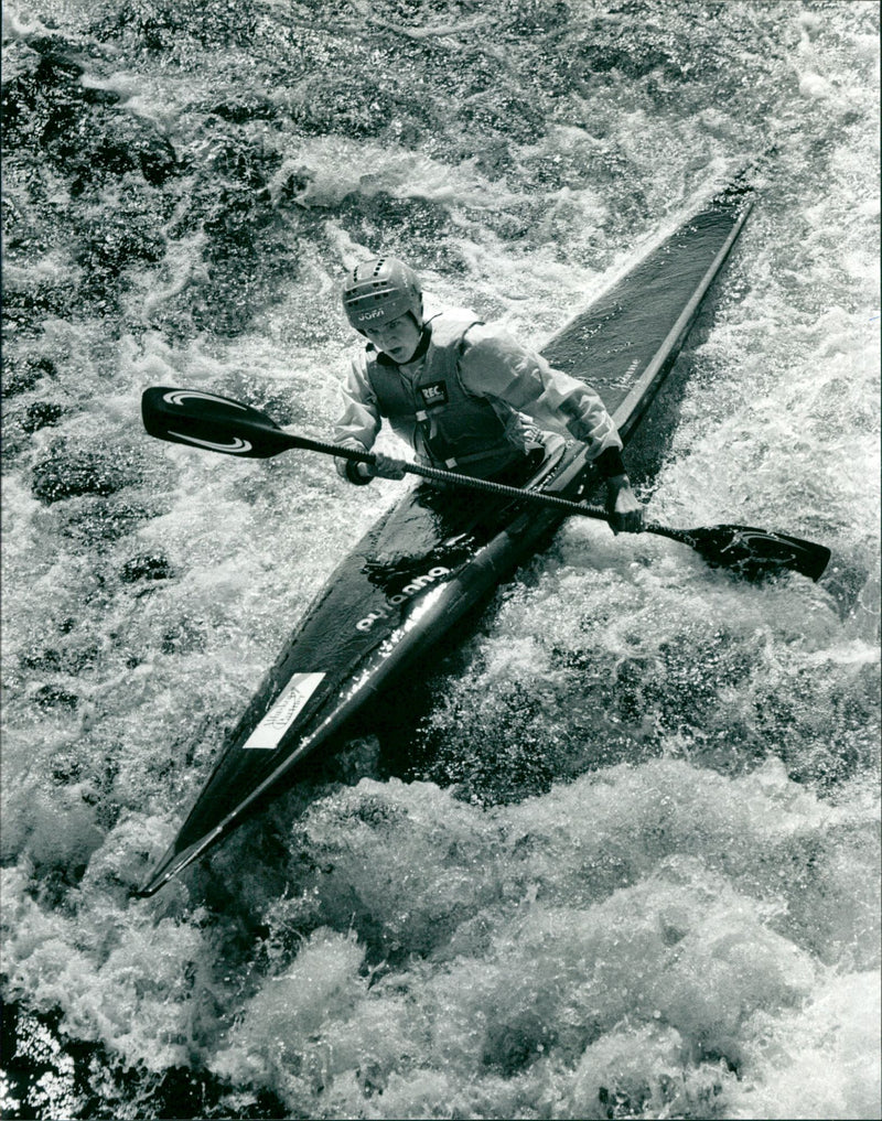 Mats Andersson, Åmsele, paddles the shoal river in the pre-World Cup canoe slalom - Vintage Photograph
