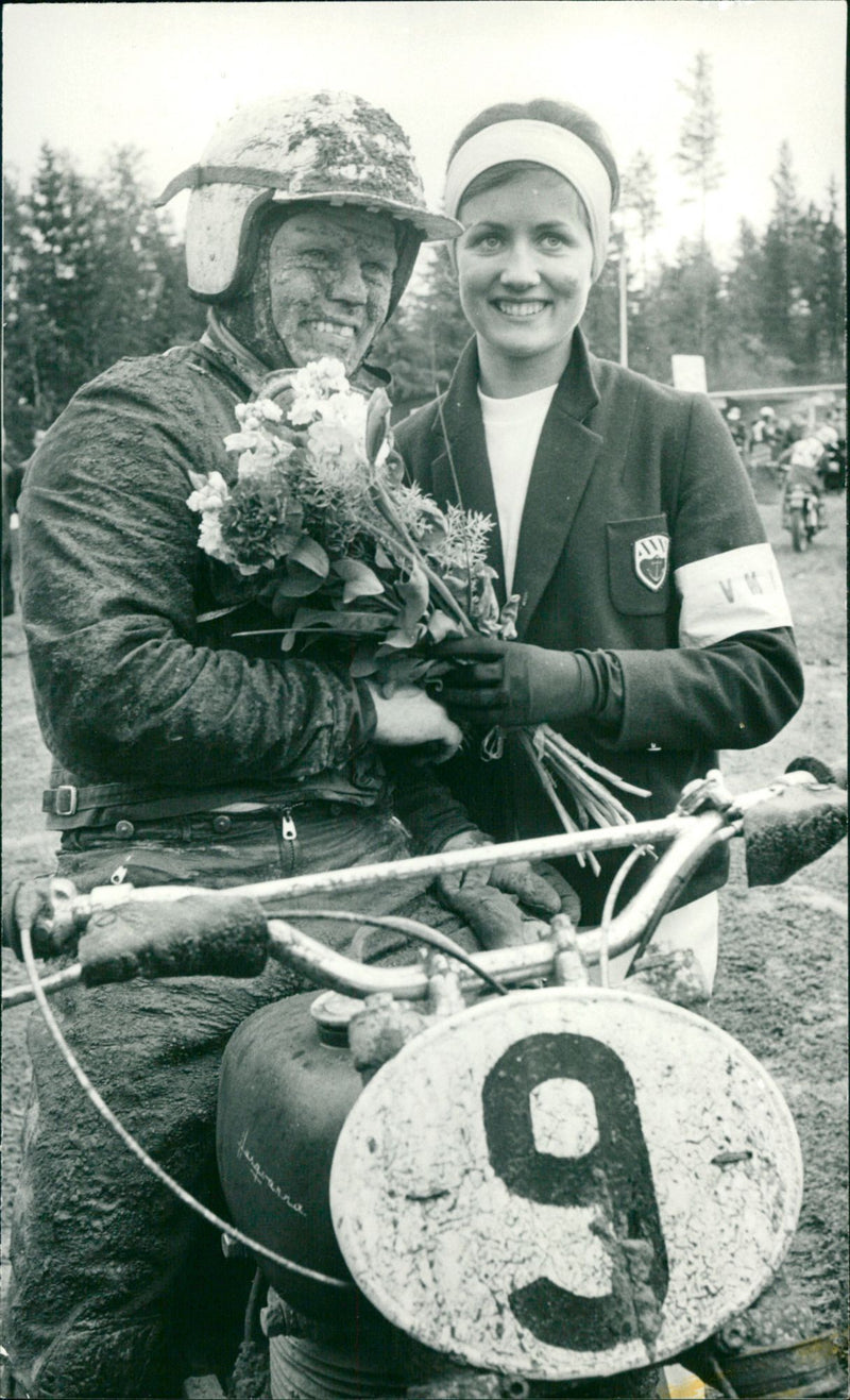 Motorcross winners receive a bouquet of flowers - Vintage Photograph