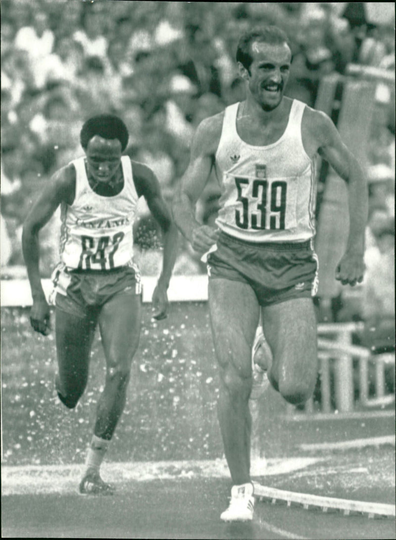 Bronislav Malinovsky wins ahead of Filbert Bayi in 3000 m hurdles - Vintage Photograph