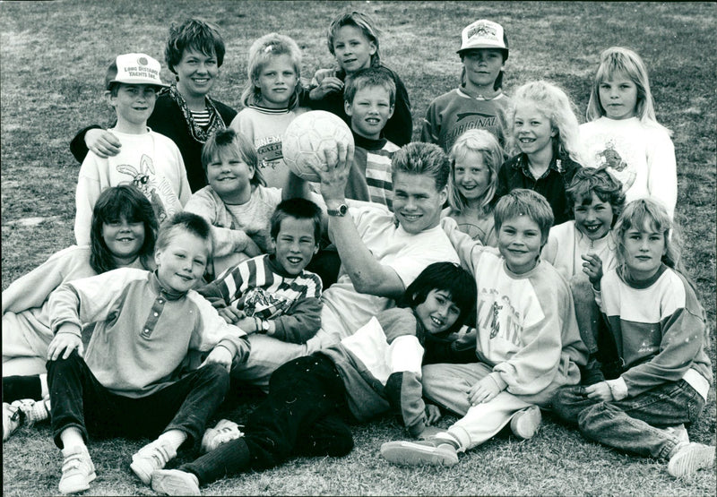 Mats-Ola Borglund surrounded by children - Vintage Photograph