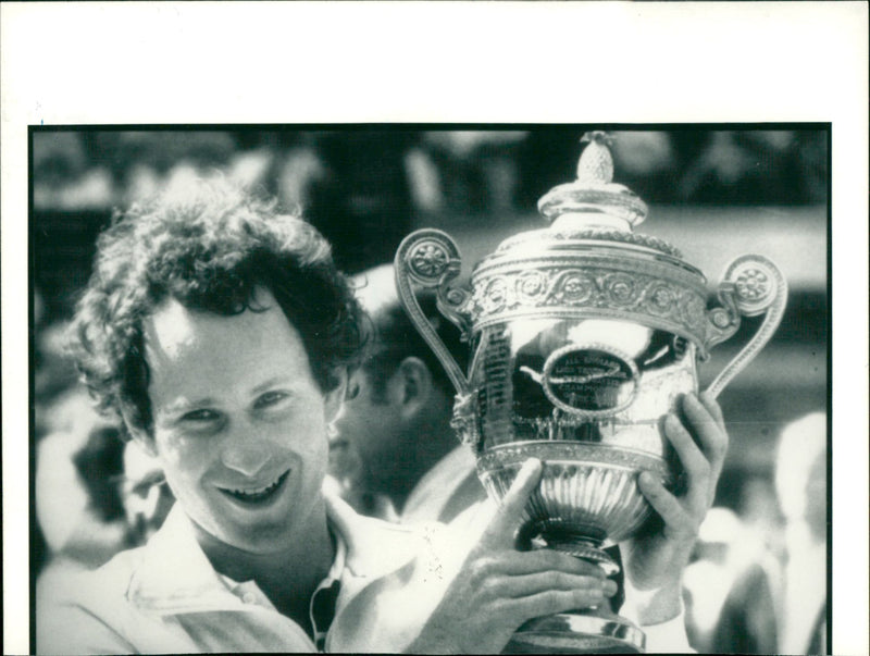 John McEnroe with the Wimbledon trophy - Vintage Photograph