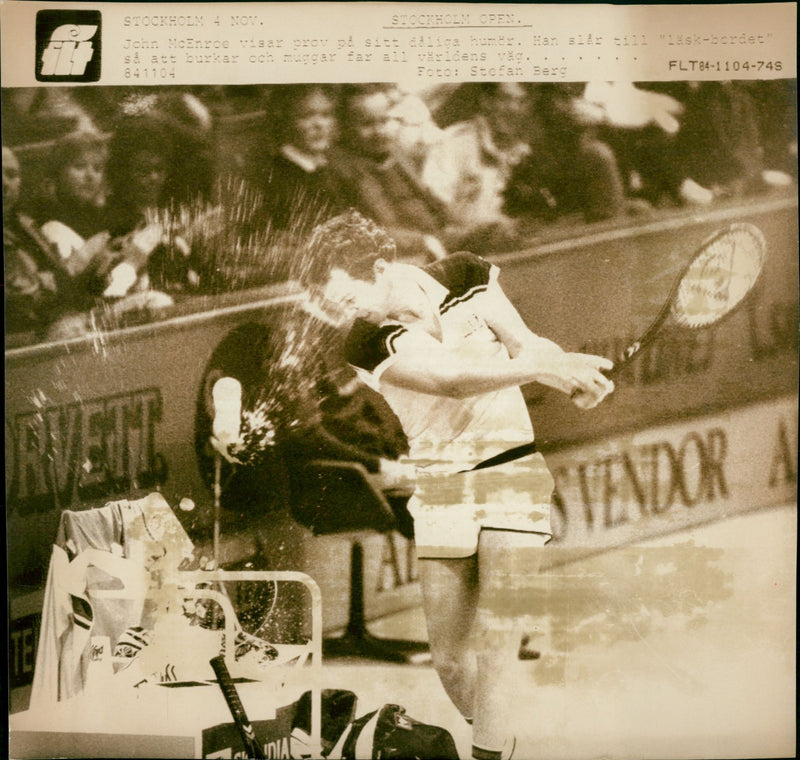 John McEnroe hits the "soda table" at the Stockholm Open - Vintage Photograph