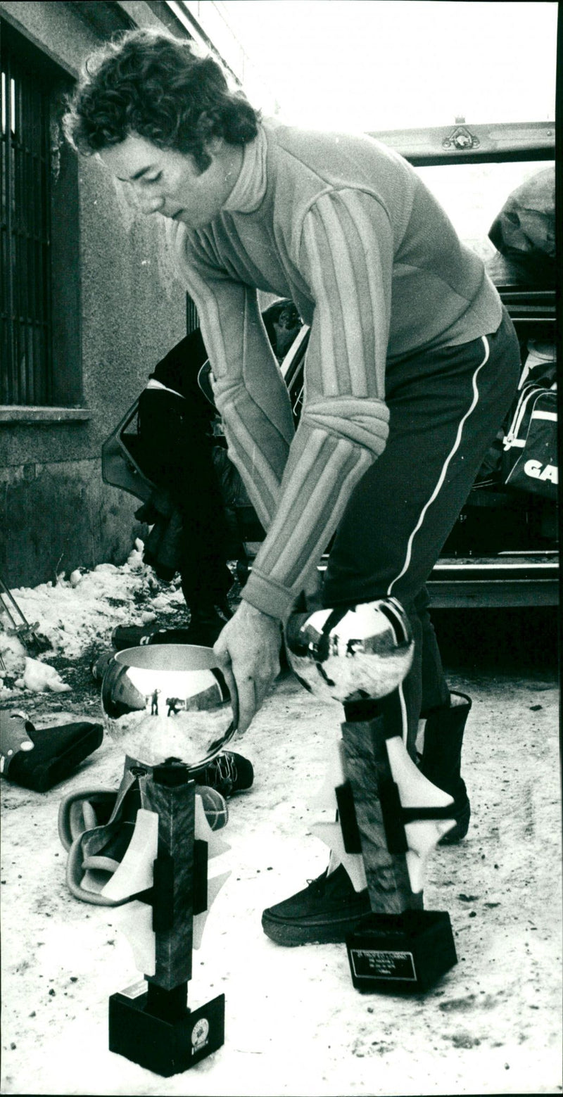 Ingemar Stenmark with the prize cups at the car in Bormio - Vintage Photograph