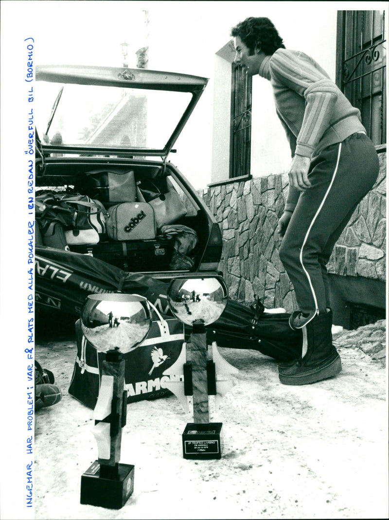 Ingemar Stenmark has problems, how will he fit all the trophies in his car. Bormio - Vintage Photograph