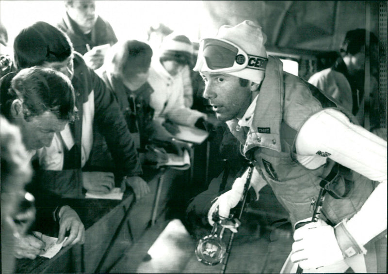 Grand slalom in Adelboden. Ingemar Stenmark gives press conference in a kiosk - Vintage Photograph