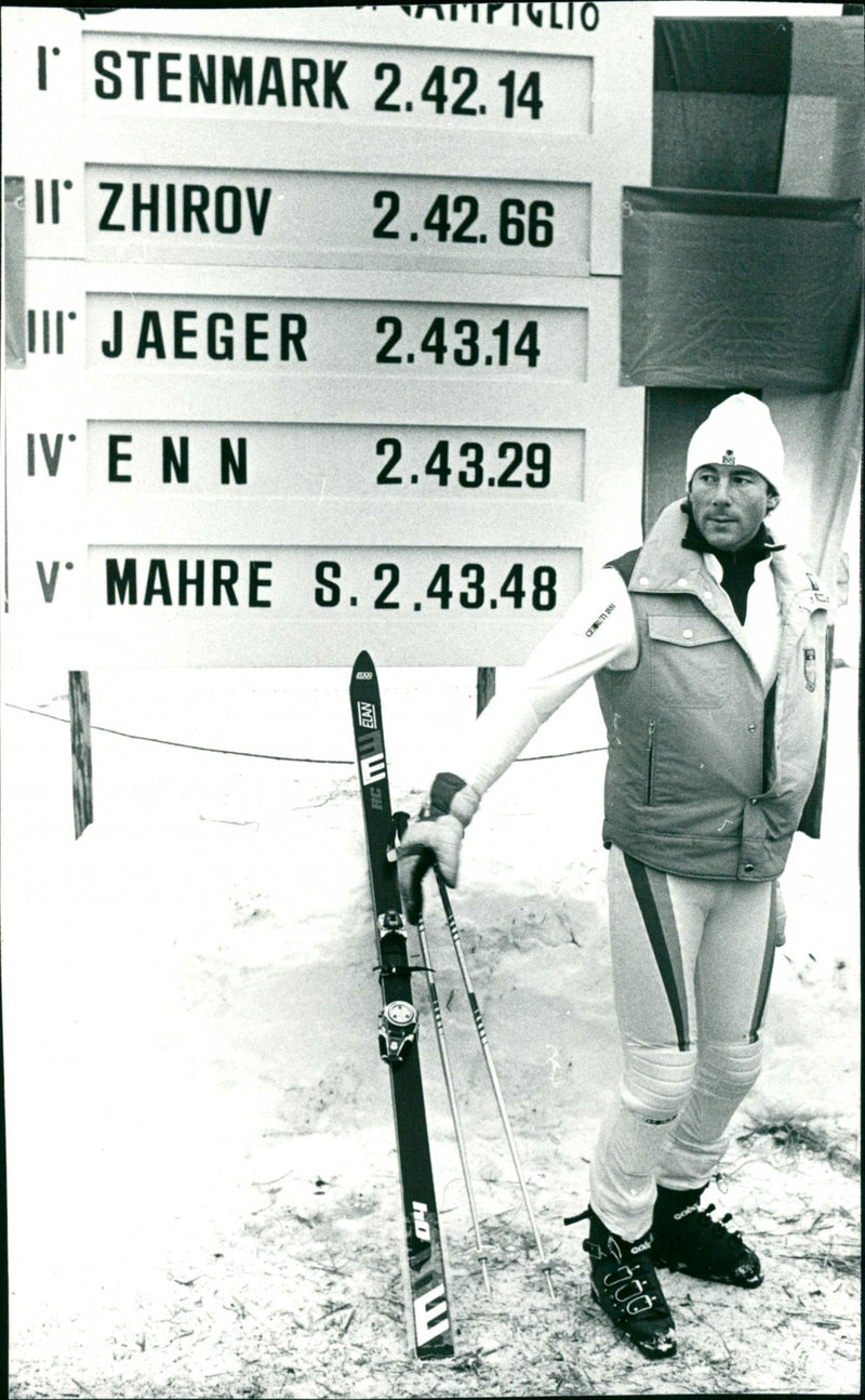 Ingemar Stenmark at the scoreboard in Madonna di Campiglio showing 1st place - Vintage Photograph