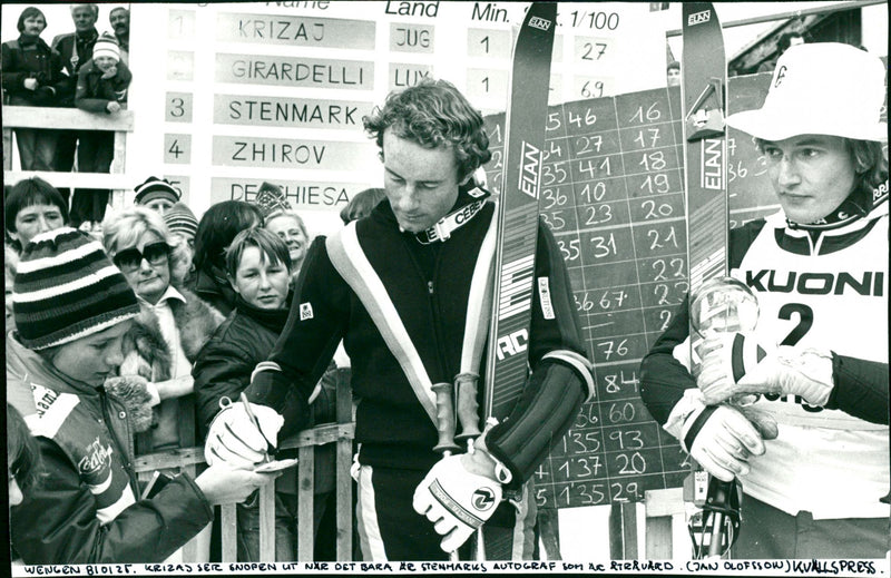 Ingemar Stenmark writes autographs. Bojan Križaj on the right - Vintage Photograph