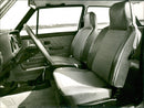 A side view of Volkswagen Golf front seats and control panel - Vintage Photograph