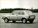 A side view of Volkswagen Golf car - Vintage Photograph