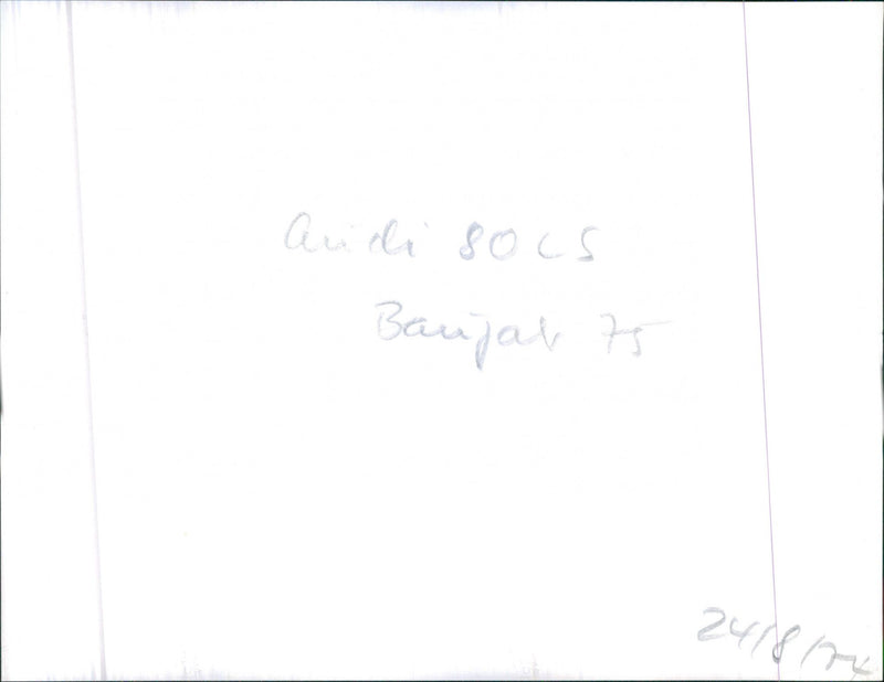 A view of Audi 80 LS parked next to a building - Vintage Photograph