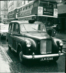 Austin, vintage car, London taxi - Vintage Photograph