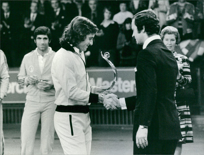 Guillermo Vilas receives an award from King Carl Gustaf - Vintage Photograph