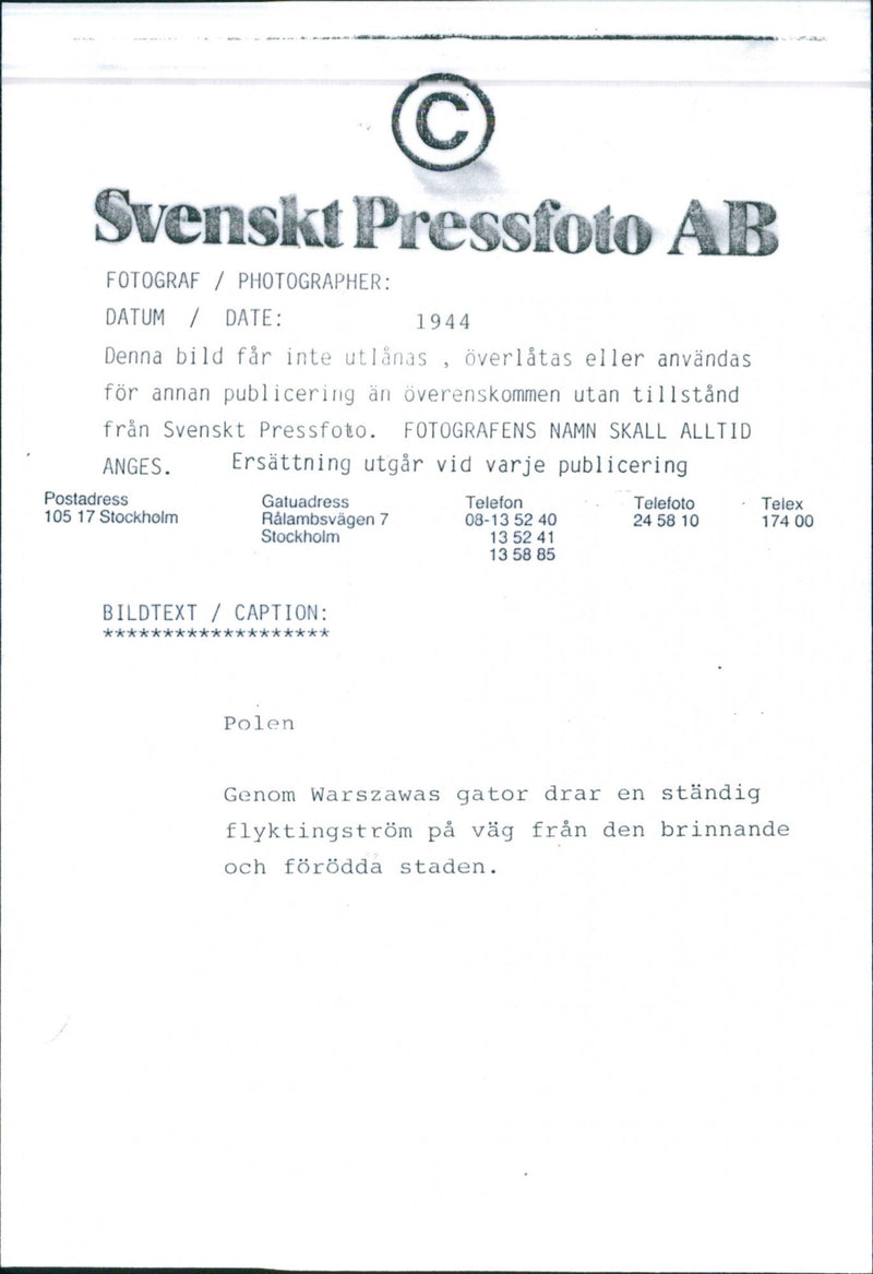 Through Warsaw's streets, a constant stream of refugees pulls away from the burning city - Vintage Photograph