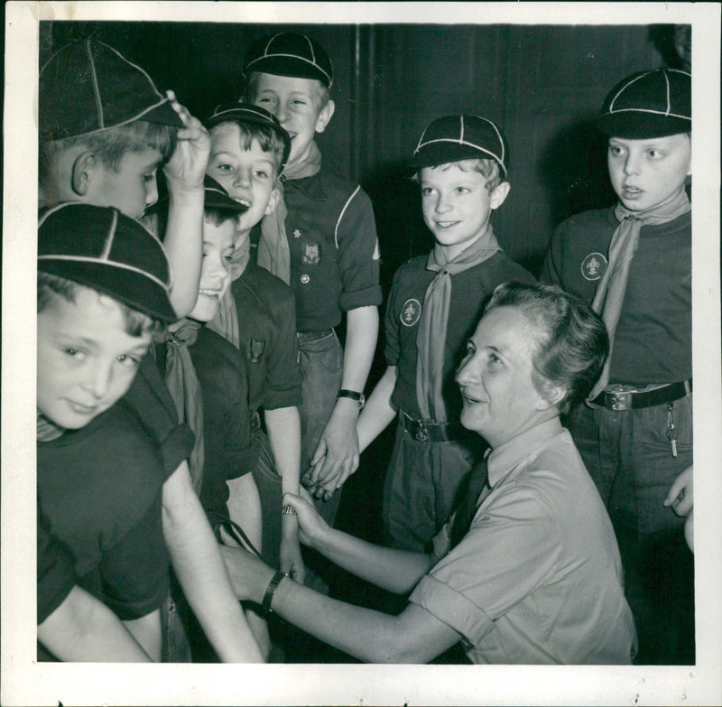 Scout party in the Concert Hall. Leader Ingrid Ericsson instructs her wolf cubs. Closest to her is Crown Prince Carl Gustaf - Vintage Photograph