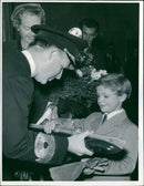 Ubåtsuställning. Crown Prince Carl Gustaf receives an electric submarine model by Admiral Stig H: son Ericson - Vintage Photograph