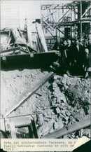 From the bombed Warsaw. A family looks at the remains of their home - Vintage Photograph