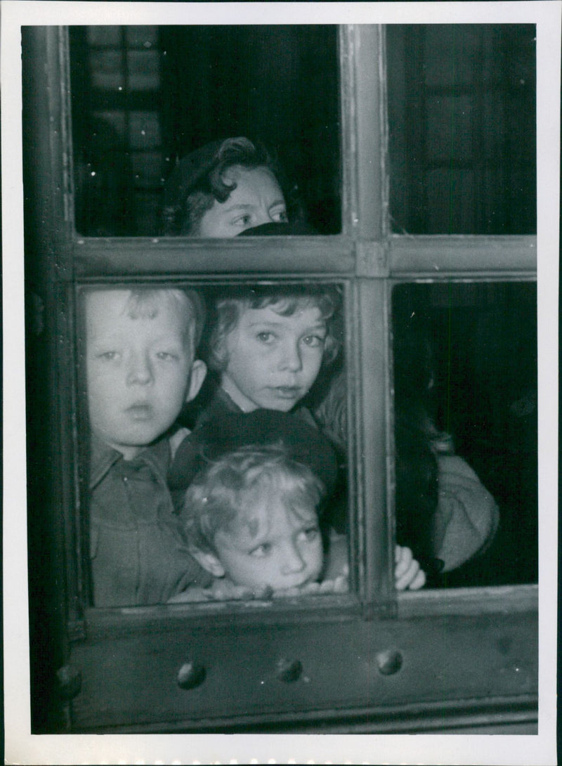 Princess Christina and Prince Carl Gustaf with playmate Gustaf Lewenhaupt watch the stroller through the window - Vintage Photograph