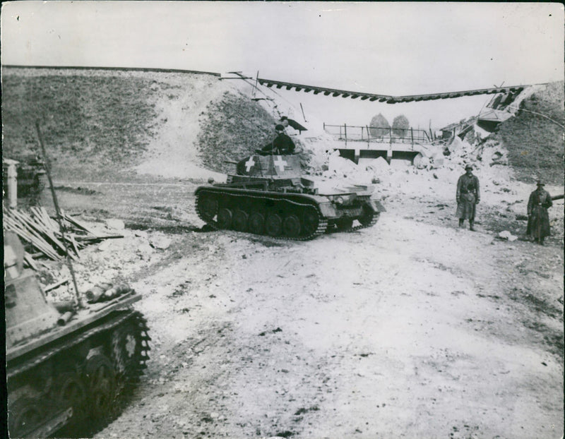 A German tank band passes a blasted railway viaduct during the Polish offensive - Vintage Photograph