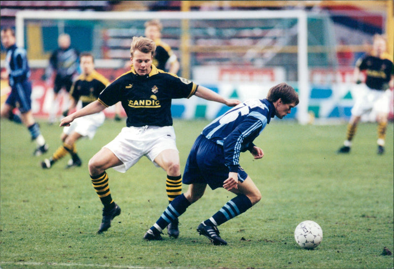 Stefan Alvén in Djurgården turns away AIK's Robert Johansson in Skandiacupen - Vintage Photograph