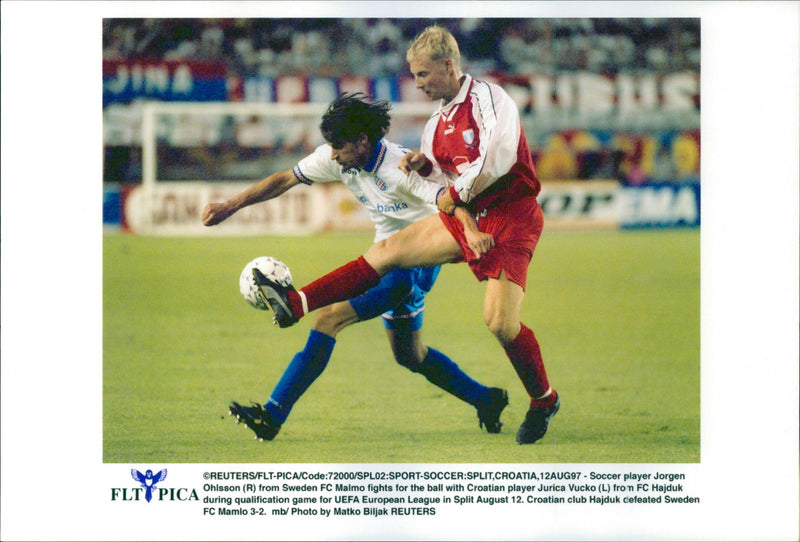 Sweden's Jörgen Ohlsson fights the ball with Croatia's Jurica Vucko - Vintage Photograph