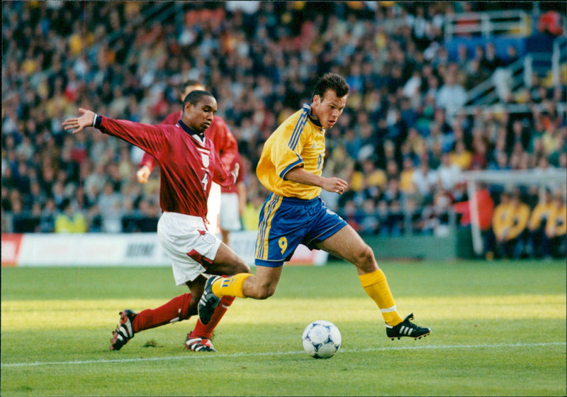 Football: Sweden-England 2-1. Fredrik Ljungberg in action against Paul Ince - Vintage Photograph