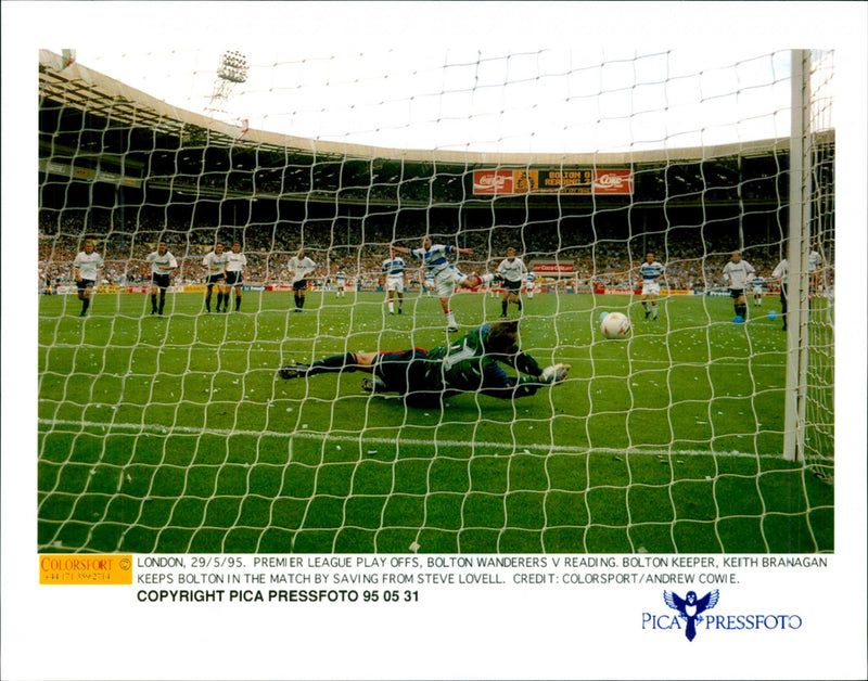 Bolton Wanderers v Reading. Bolton goalkeeper Keith Branagan rescues from Steve Lovell - Vintage Photograph