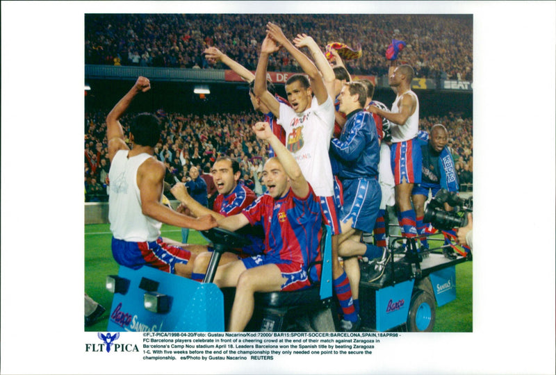 FC Barcelona celebrates victory against Zaragoza raised by crowd in 1998 - Vintage Photograph