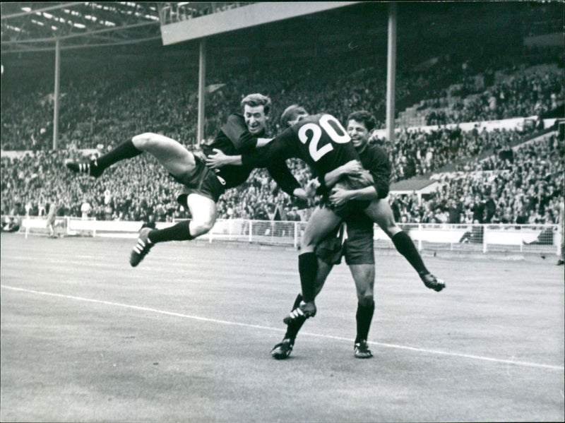 Soccer World Cup 1966. France v Mexico. Enrique Borja is embraced by his teammates after the goal against Mexico - Vintage Photograph