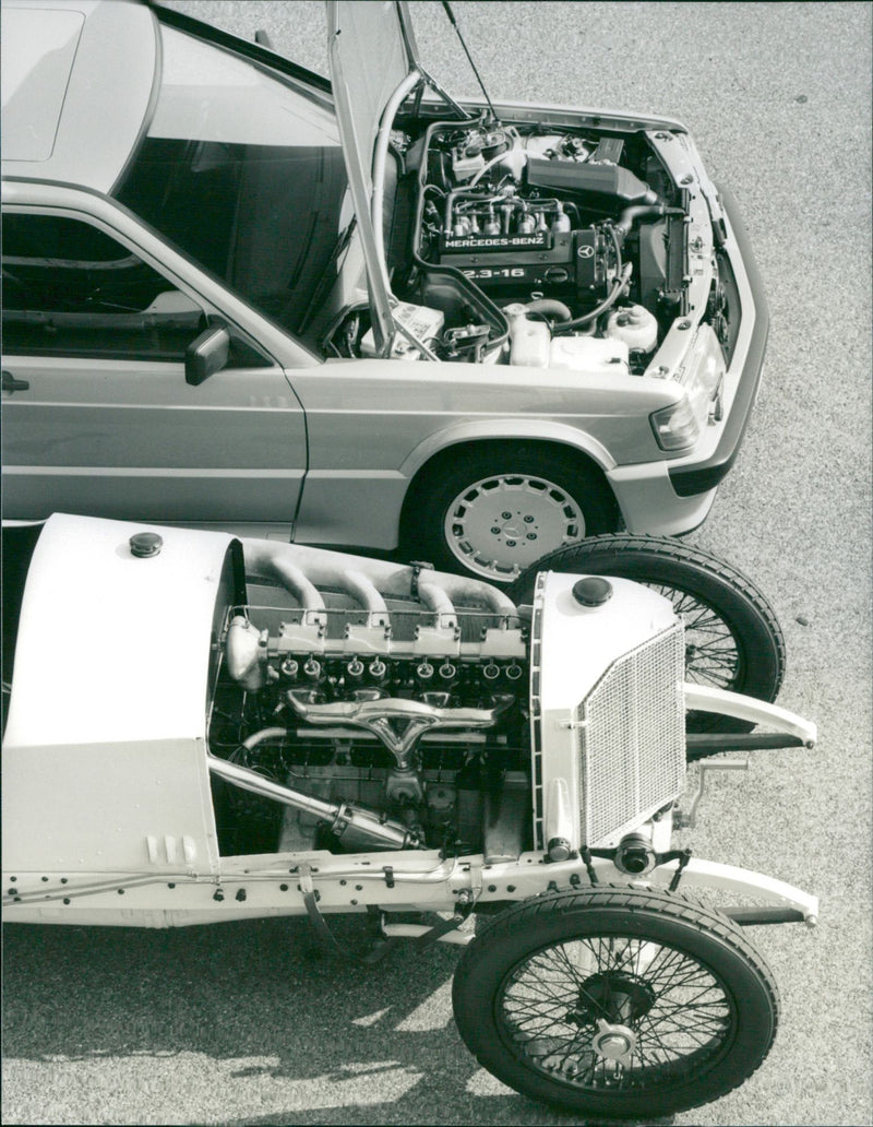 1914 Mercedes Benz and 1984 Mercedes Benz 190 E 2.3-16. - Vintage Photograph